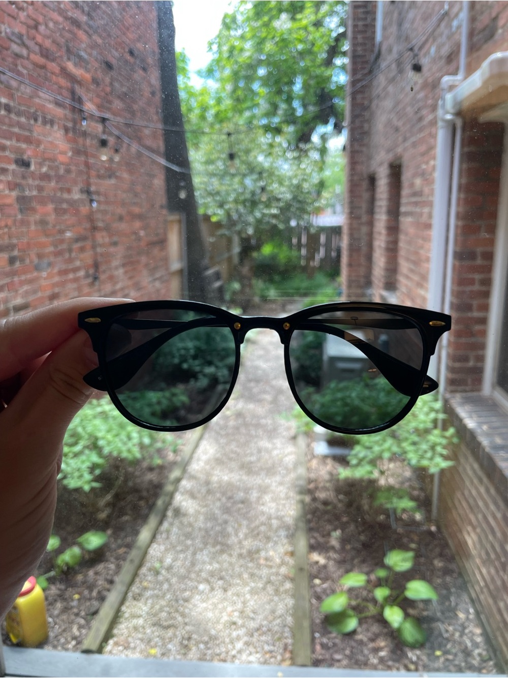 Black & gold club-master style sunglasses